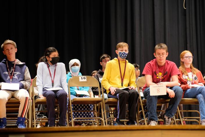 Contestants of the Potter County Spelling Bee await their turn at the microphone to show off their spelling prowess Thursday.