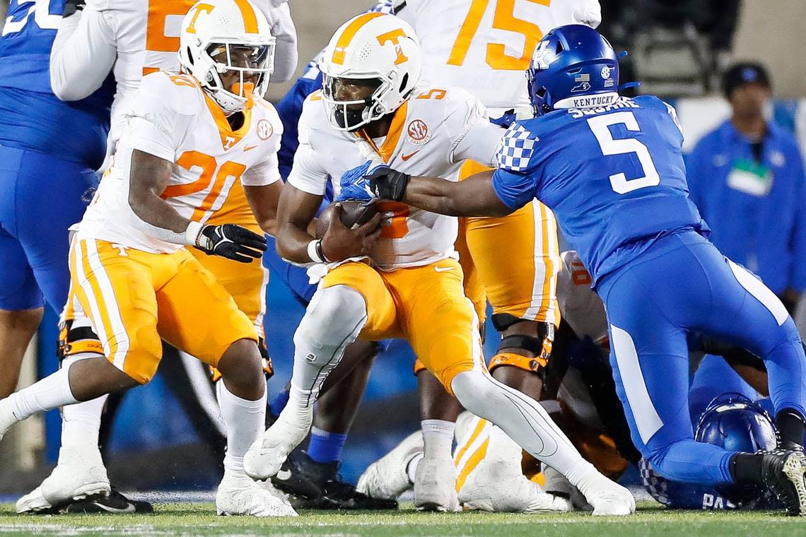 Kentucky’s DeAndre Square (5) sacks Tennessee quarterback Hendon Hooker (5) during last year’s meeting won by the Volunteers in Lexington.