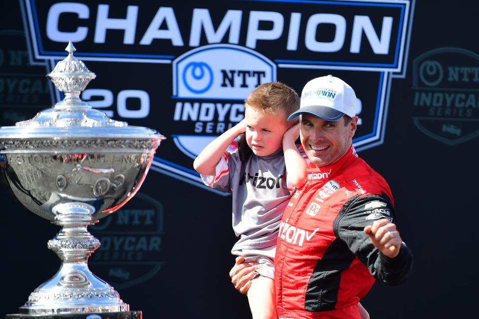 Will Powerwith son Beau William celebrates after winning the 2022 NTT IndyCar Series championship following the Grand Prix of Monterey at WeatherTech Raceway Laguna Seca on Sept. 11.