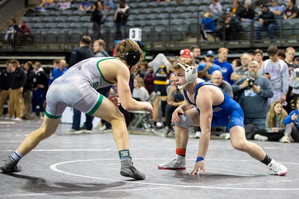 Underwood's Gable Porter, right, won the Council Bluffs Wrestling Classic on Saturday at the Mid-America Center. Garvin went 8-0 won at 132 pounds.