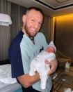 <p>Conor McGregor and fiancée Dee Devlin <a href="https://people.com/parents/conor-mcgregor-dee-devlin-welcome-third-baby/" rel="nofollow noopener" target="_blank" data-ylk="slk:welcomed their third baby together;elm:context_link;itc:0;sec:content-canvas" class="link ">welcomed their third baby together</a>, a son, the mixed martial arts fighter announced on Instagram on May 17.</p> <p>Baby Rían joins big brother<a href="https://people.com/parents/ufc-champion-conor-mcgregor-welcomes-son-conor-jack/" rel="nofollow noopener" target="_blank" data-ylk="slk:Conor Jack Jr.;elm:context_link;itc:0;sec:content-canvas" class="link ">Conor Jack Jr.</a>, 4, and big sister <a href="https://people.com/parents/conor-mcgregor-welcomes-second-child/" rel="nofollow noopener" target="_blank" data-ylk="slk:Croia;elm:context_link;itc:0;sec:content-canvas" class="link ">Croia</a>, 2.</p> <p>"The McGregor Clan is now a family of 5 ❤️ Healthy baby boy delivered! Baby and Mammy Wonder Woman are doing great!" McGregor wrote alongside a photo of him cradling his new baby boy. "God I thank you for everything you give to me and my family in this world 🙏 My new born son, Rían McGregor ❤️."</p>