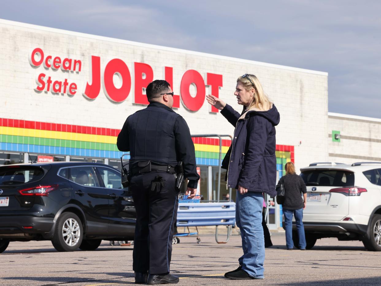 Brockton police, Massachusetts State Police and the Plymouth County Sherriff Department's Bureau of Criminal Investigation investigate at the scene of a shooting inside Ocean State Job Lot in Brockton on Sunday, Nov. 5, 2023.
