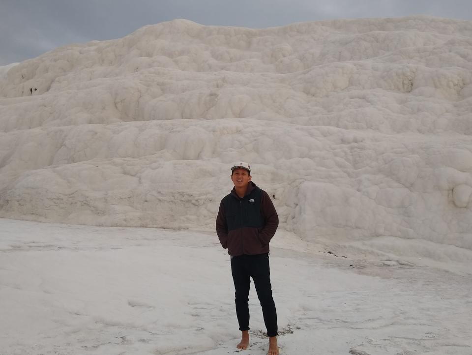 Tino Roco standing in white landscape