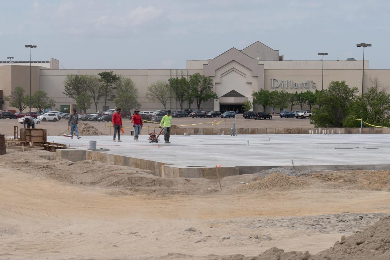 Construction crews work on building a new La-Z-Boy Home Furnishing at 1935 S.W. Wanamaker Road.