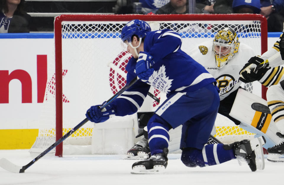 Toronto Maple Leafs' Mitch Marner (16) scores on Boston Bruins goaltender Jeremy Swayman during the third period in Game 4 of an NHL hockey Stanley Cup first-round playoff series in Toronto on Saturday, April 27, 2024. (Frank Gunn/The Canadian Press via AP)