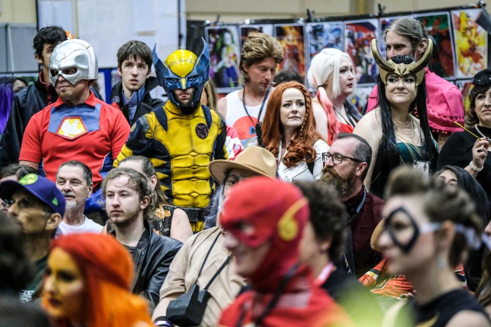 Plenty of costumed fans showed up for the wedding of Lansing's Batman, Shamus Smith and Capital City Wonder Woman, Katie Whittaker at the Capital City Comic Con event at the Lansing Center Sunday, July 10, 2022.