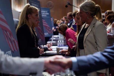 FILE PHOTO -  People attend the Executive Branch Job Fair hosted by the Conservative Partnership Institute at the Dirksen Senate Office Building in Washington, U.S., June 15, 2018. REUTERS/Toya Sarno Jordan