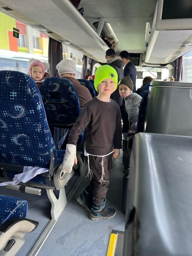 300 orphans left on a bus, leaving behind their possessions and homes in Ukraine, and traveled to Romania.