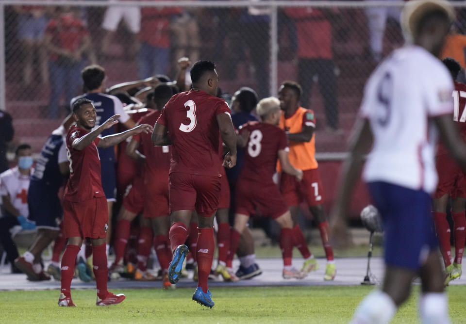 Panama's Anibal Godoy celebrates with teammates after scoring his side's opening goal against United States during a qualifying soccer match for the FIFA World Cup Qatar 2022 at Rommel Fernandez stadium, Panama city, Panama, Sunday, Oct. 10, 2021. (AP Photo/Arnulfo Franco)