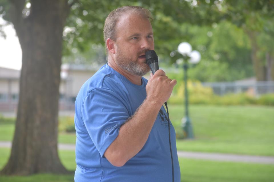 Todd Nighswander, Deerfield village president, shares some words Friday about the Deerfield community during this weekend's sesquicentennial celebration in Deerfield.