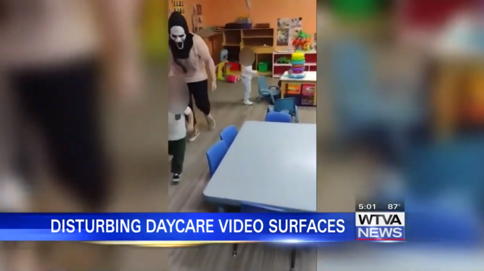 Video footage from inside a Mississippi daycare shows employees chasing after frightened toddlers as they don a Halloween mask (WTVA 9/video screengrab)