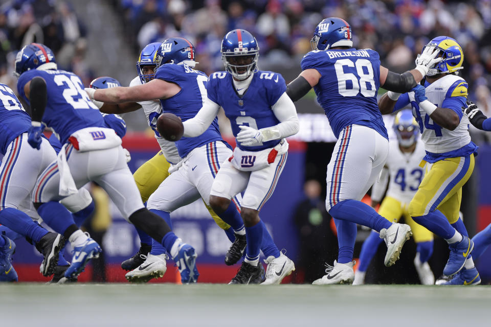 New York Giants quarterback Tyrod Taylor (2) throws during the second half an NFL football game against the Los Angeles Rams, Sunday, Dec. 31, 2023, in East Rutherford, N.J. (AP Photo/Adam Hunger)