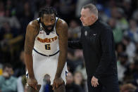 Denver Nuggets center DeAndre Jordan (6) and head coach Michael Malone talk during the second half of an NBA basketball game against the Minnesota Timberwolves, Sunday, Feb. 5, 2023, in Minneapolis. (AP Photo/Abbie Parr)