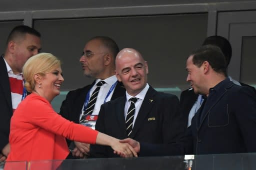 Russian Prime Minister Dmitry Medvedev watched the game with Croatia's President Kolinda Grabar-Kitarovic and FIFA President Gianni Infantino