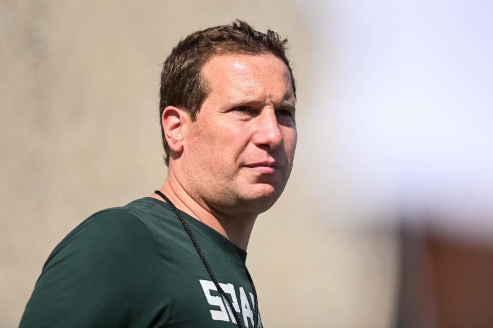 Former MSU basketball player Mat Ishbia watches from the sideline during Michigan State's game against Youngstown State on Saturday, Sept. 11, 2021, at Spartan Stadium in East Lansing.