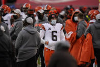 Cleveland Browns quarterback Baker Mayfield stands on the sideline during the second half of an NFL divisional round football game against the Kansas City Chiefs, Sunday, Jan. 17, 2021, in Kansas City. (AP Photo/Jeff Roberson)