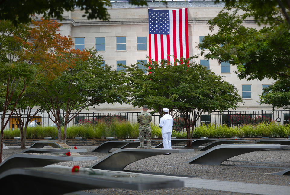 <p>Members of the military are seen on the grounds of the National 9/11 Pentagon Memorial before the start of the September 11th Pentagon Memorial Observance at the Pentagon on the 17th anniversary of the September 11th attacks, Tuesday, Sept. 11, 2018. (AP Photo/Pablo Martinez Monsivais) </p>