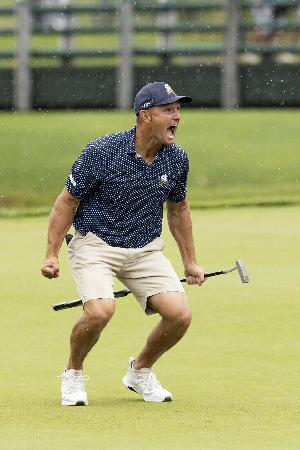 Captain Bryson DeChambeau, of Crushers GC, reacts after winning on the 18th hole during the final round of LIV Golf Greenbrier at The Old White at The Greenbrier, Sunday, Aug. 6, 2023, in White Sulfur Springs, W.Va. (Scott Taetsch/LIV Golf via AP)