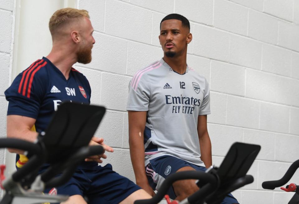 Arsenal fitness coach Sam Wilson with William Saliba during a training session at London Colney on July 11, 2022 in St Albans, England. (Photo by Stuart MacFarlane/Arsenal FC via Getty Images) (Arsenal FC via Getty Images)