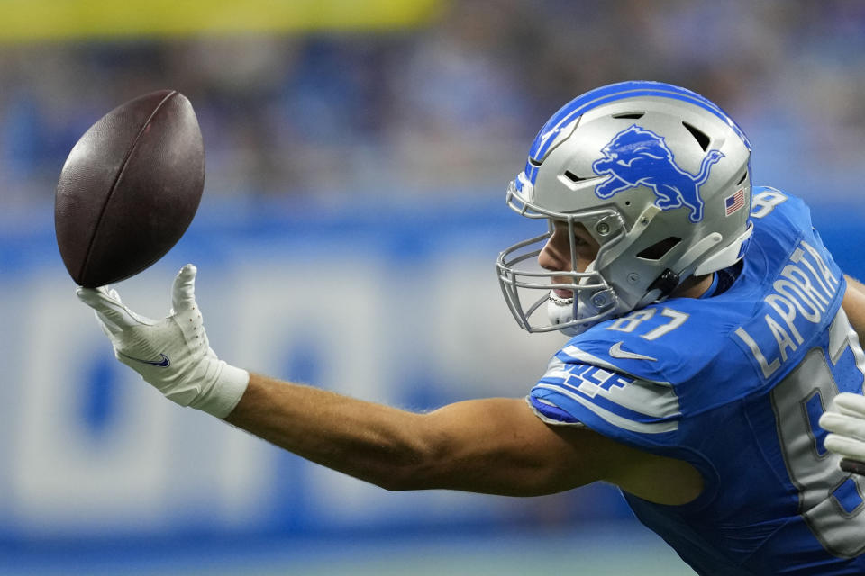 FILE - Detroit Lions tight end Sam LaPorta (87) tries in vain to pull in a pass reception in the first half of an NFL football game against the Carolina Panthers in Detroit, Sunday, Oct. 8, 2023. Sam LaPorta is a finalist for The Associated Press 2023 Offensive Rookie of the Year.(AP Photo/Paul Sancya, File)