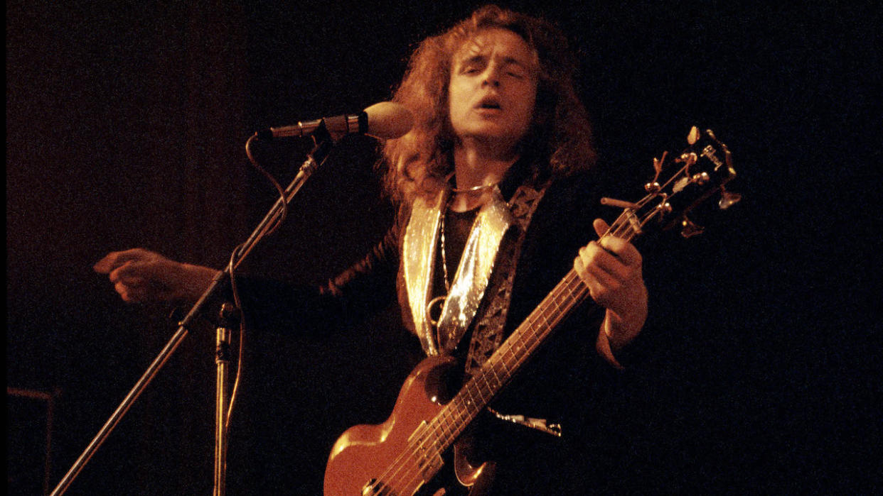  Jack Bruce of West, Bruce & Laing performs on stage in 1973 in Copenhagen, Denmark. He plays a Gibson EB-3 bass guitar. 
