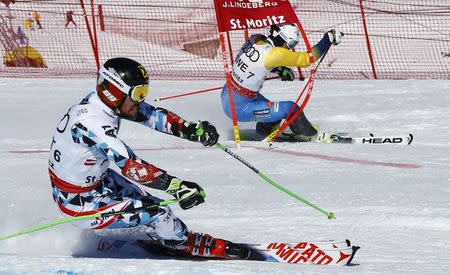 Alpine Skiing - FIS Alpine Skiing World Championships - Alpine Team Event - St. Moritz, Switzerland - 14/2/17 - Austria's Marcel Hirscher (L) skis in parallel slalom against Sweden's Andre Myhrer during the Mixed Team event. REUTERS/Ruben Sprich