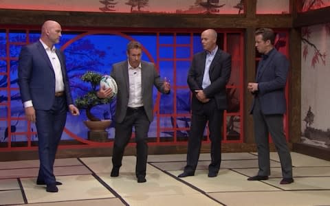 Wilkinson, Sir Clive Woodward, Lawrence Dallaglio, the ex-England captain, and presenter Craig Doyle in socks - Credit: ITV