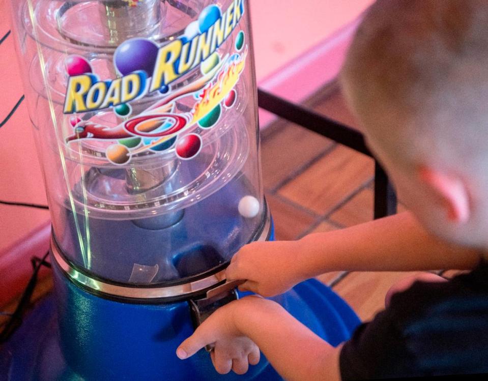 Casper McAllister gets a gumball from the machine at Rey Azteca on Monday, June 26, 2023.