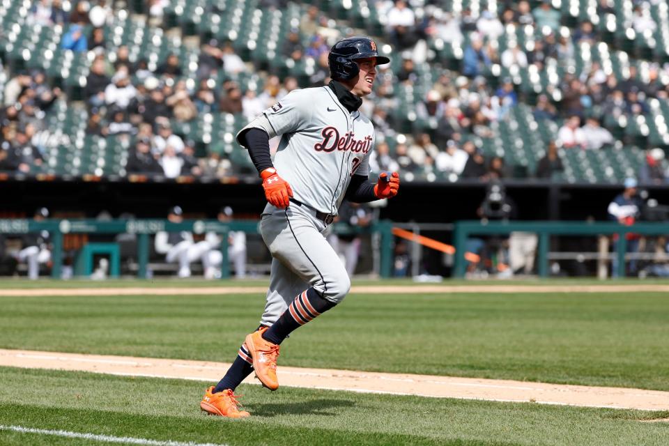 Detroit Tigers' Kerry Carpenter rounds the bases after hitting a solo home run against the Chicago White Sox during the fourth inning at Guaranteed Rate Field in Chicago on Sunday, March 31, 2024.