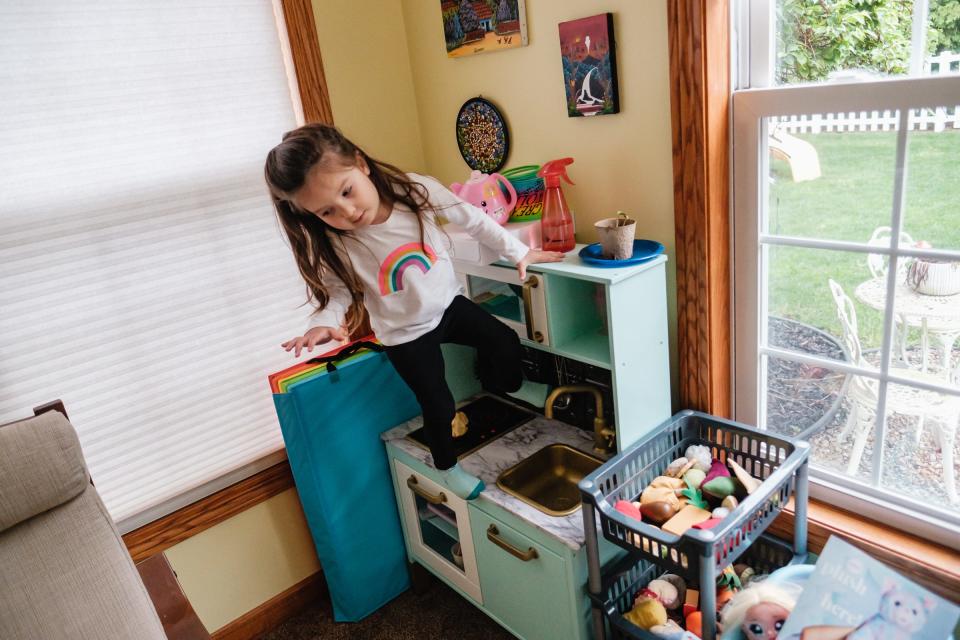 Regan Bostic, 3, plays at home on Wednesday in New Philadelphia.