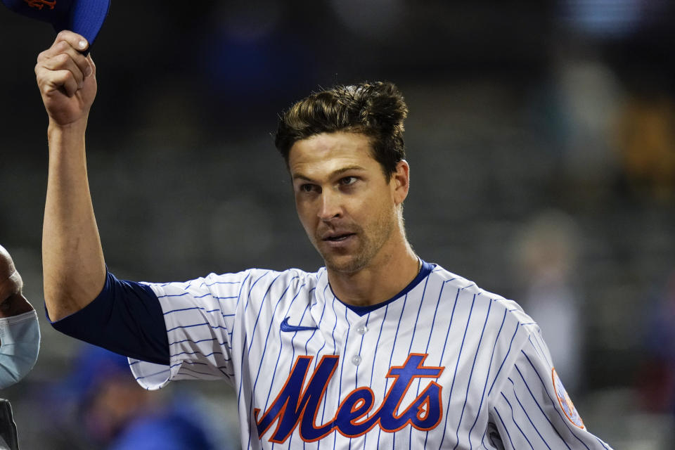 New York Mets starting pitcher Jacob deGrom tips his cap to fans after a baseball game against the Washington Nationals Friday, April 23, 2021, in New York. The Mets won 6-0. (AP Photo/Frank Franklin II)