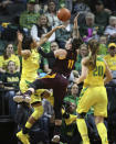 Oregon's Satou Sabally, left, blocks a shot by Arizona State's Robbi Ryan during the first half of an NCAA college women's basketball game Friday, Jan. 18, 2019, in Eugene, Ore. (AP Photo/Chris Pietsch)