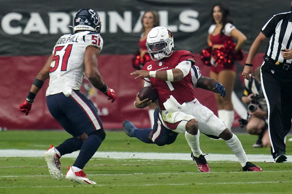 Arizona Cardinals quarterback Kyler Murray (1) tries to avoid Houston Texans outside linebacker Kamu Grugier-Hill (51) during the second half of an NFL football game, Sunday, Oct. 24, 2021, in Glendale, Ariz. (AP Photo/Ross D. Franklin)