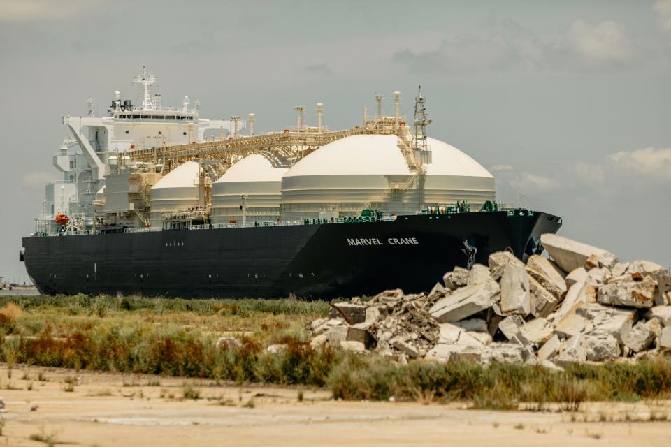 A ship carries liquid natural gas on the Calcasieu Pass Ship Canal on May 17, 2022.