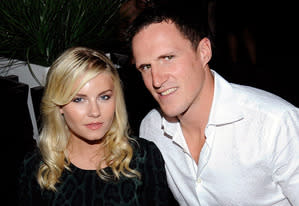 Elisha Cuthbert and Dion Phaneuf | Photo Credits: Aaron Harris/Getty Images