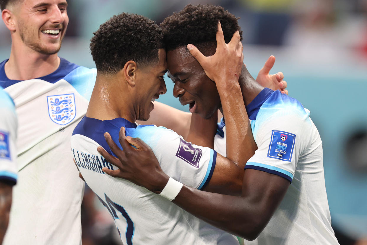 DOHA, QATAR - NOVEMBER 21: Bukayo Saka of England celebrates the second goal with Jude Bellingham of England during the FIFA World Cup Qatar 2022 Group B match between England and IR Iran at Khalifa International Stadium on November 21, 2022 in Doha, Qatar. (Photo by Charlotte Wilson/Offside/Offside via Getty Images)