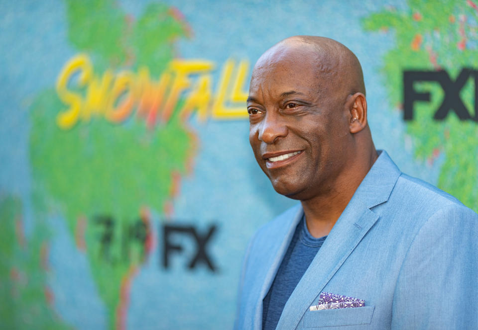 LOS ANGELES, CA - JULY 16:  John Singleton arrives to the premiere Of FX's "Snowfall" Season 2 at Regal Cinemas L.A. LIVE Stadium 14 on July 16, 2018 in Los Angeles, California.  (Photo by Christopher Polk/Getty Images)