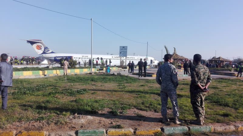 Iranian passenger plane is seen after sliding off the runway upon landing at Mahshahr airport