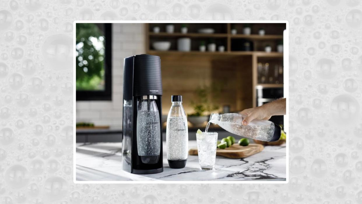  Sodastream Terra sparkling water maker appliance lifestyle image on bubble background. 