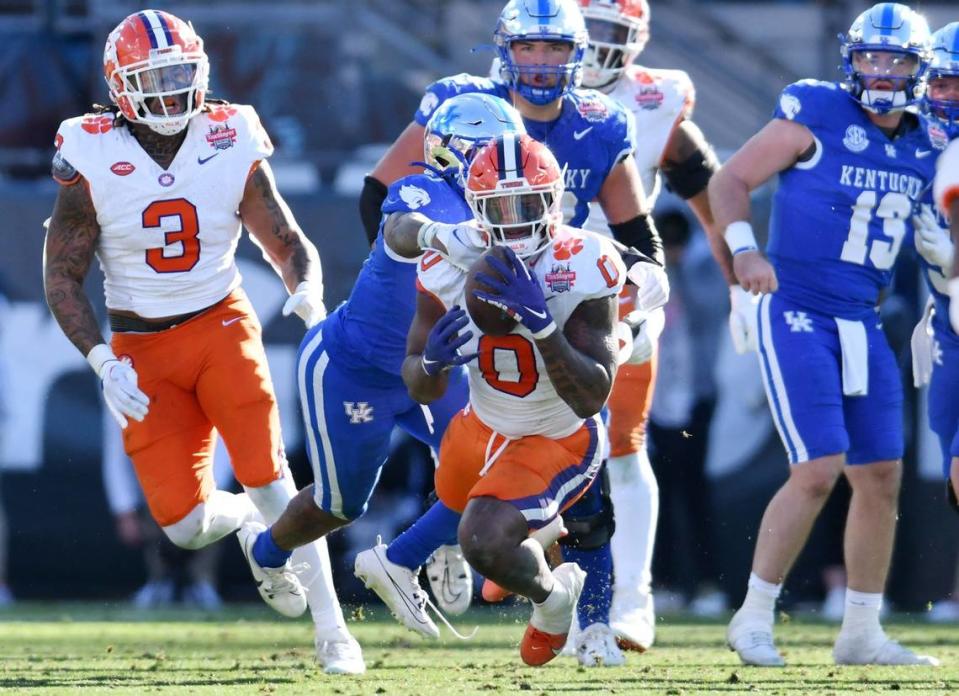 Clemson linebacker Barrett Carter (0) pulls in a deflected Kentucky pass for an interception during the fourth quarter of the Gator Bowl. The Wildcats led 14-10 at the half, but the Tigers fought back for a 38-35 victory. Bob Self/USA TODAY NETWORK