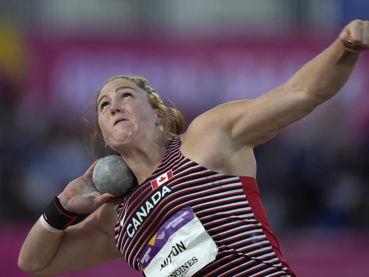 Canada's Sarah Mitton claimed the women's shot put gold medal on Wednesday at the Commonwealth Games at Alexander Stadium in Birmingham, England. (Alastair Grant/The Associated Press - image credit)