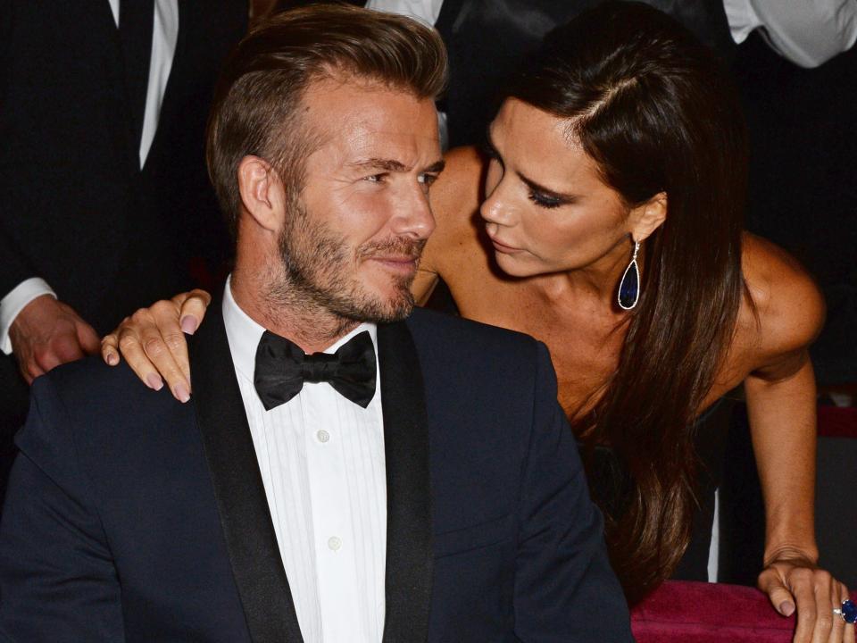 David Beckham and Victoria Beckham at the London Palladium on November 30, 2014 in London, England.