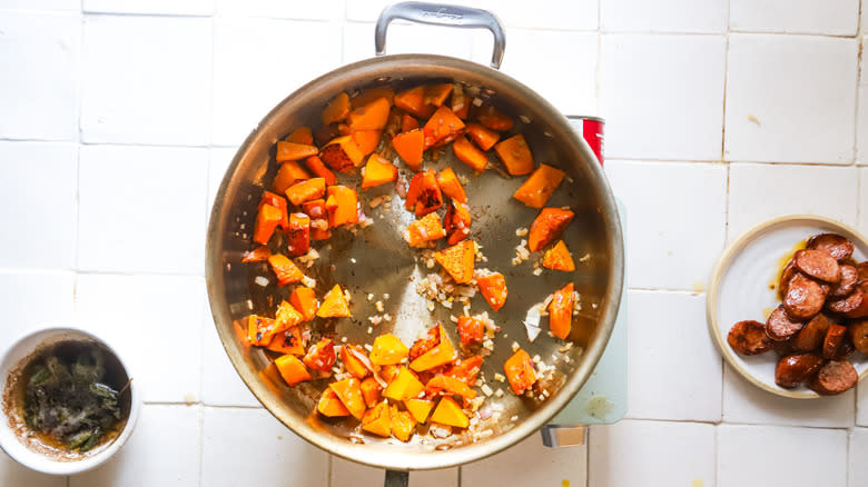 Shallot and squash in pan