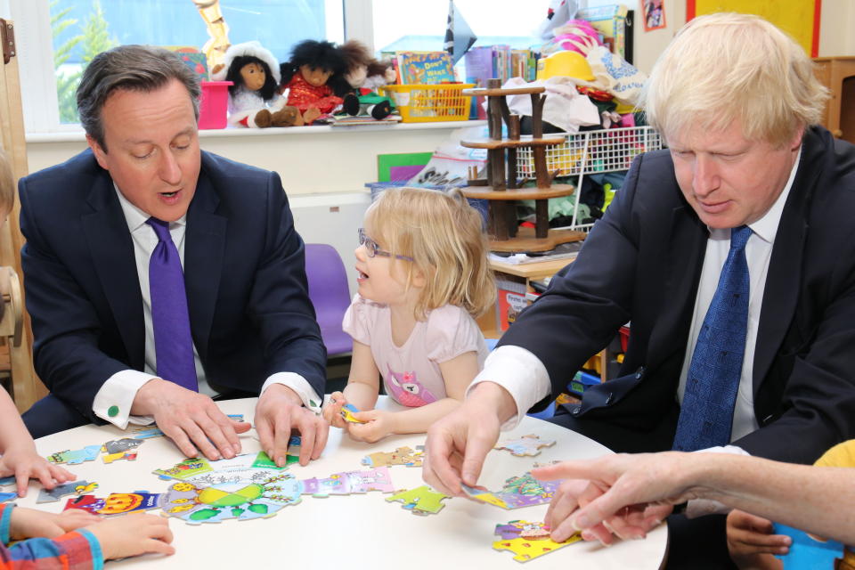 Prime Minister David Cameron (left) and Mayor of London Boris Johnson with 3 year old Staphanie during a General Election campaign visit to Advantage Children's Day Nursery in Surbiton, Surrey.