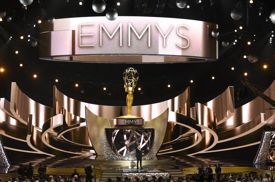 FILE - This Sept. 18, 2016 file photo shows the main stage during the 68th Primetime Emmy Awards in Los Angeles. The 72nd Emmy Awards awards will be conducted remotely and air on ABC with Jimmy Kimmel as host. (Photo by Chris Pizzello/Invision/AP, File)