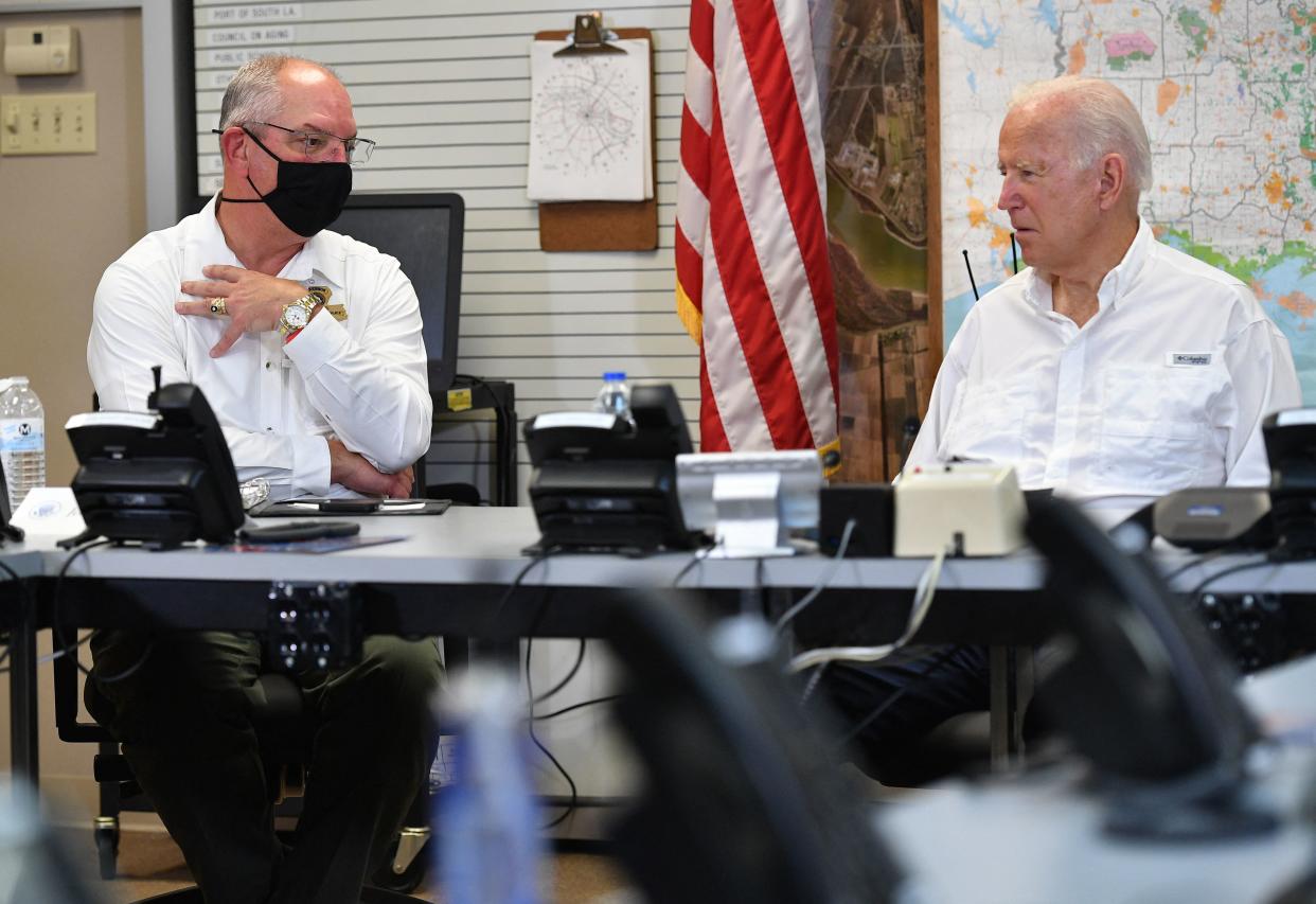 Joe Biden and John Bel Edwards, left 