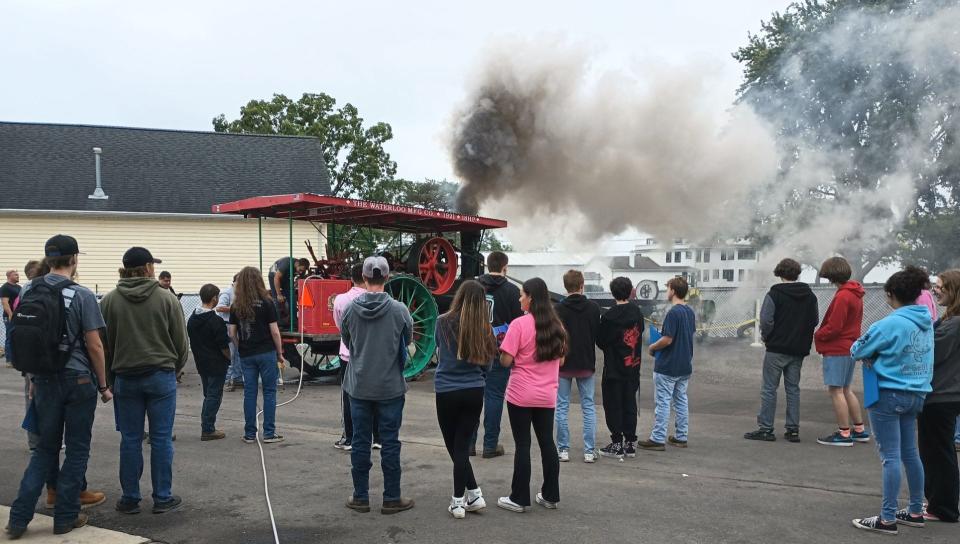 Students watched a 1921 steam engine fire up at Trout’s Yacht Services during the recent Maritime Career Day.
