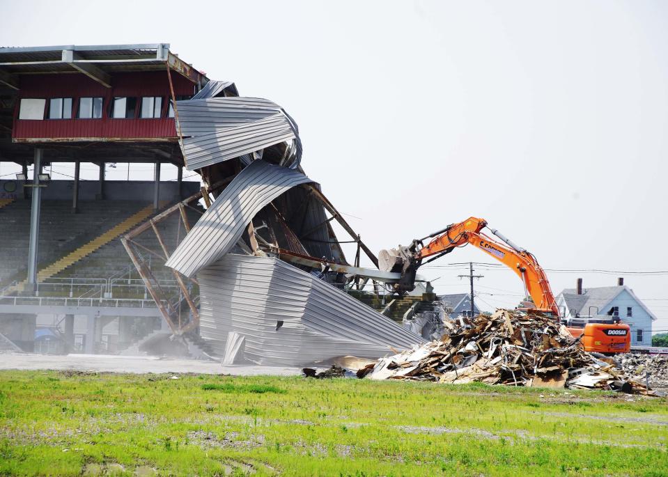 The front of the Brockton Fairgrounds grandstand as the roof is being torn down on Monday, July 17, 2023.