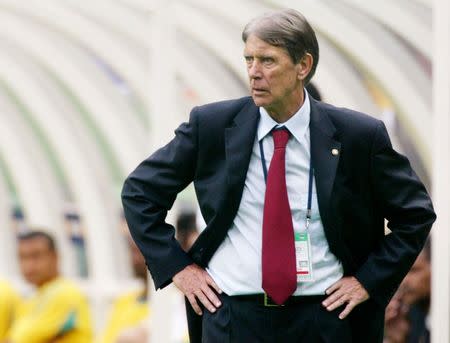 Paraguay's coach Cesare Maldini watches as his team plays to a 2-2 draw against South Africa in their World Cup Finals match in Pusan June 2, 2002. Slovenia, Paraguay, South Africa and Spain are competing in Group B in the World Cup Finals. REUTERS/Desmond Boylan