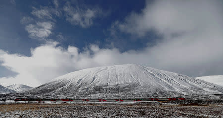 The LNER Inverness to London train makes its way through the Drumochter Pass, Scotland, Britain March 11, 2019. Picture taken March 11, 2019. REUTERS/Russell Cheyne